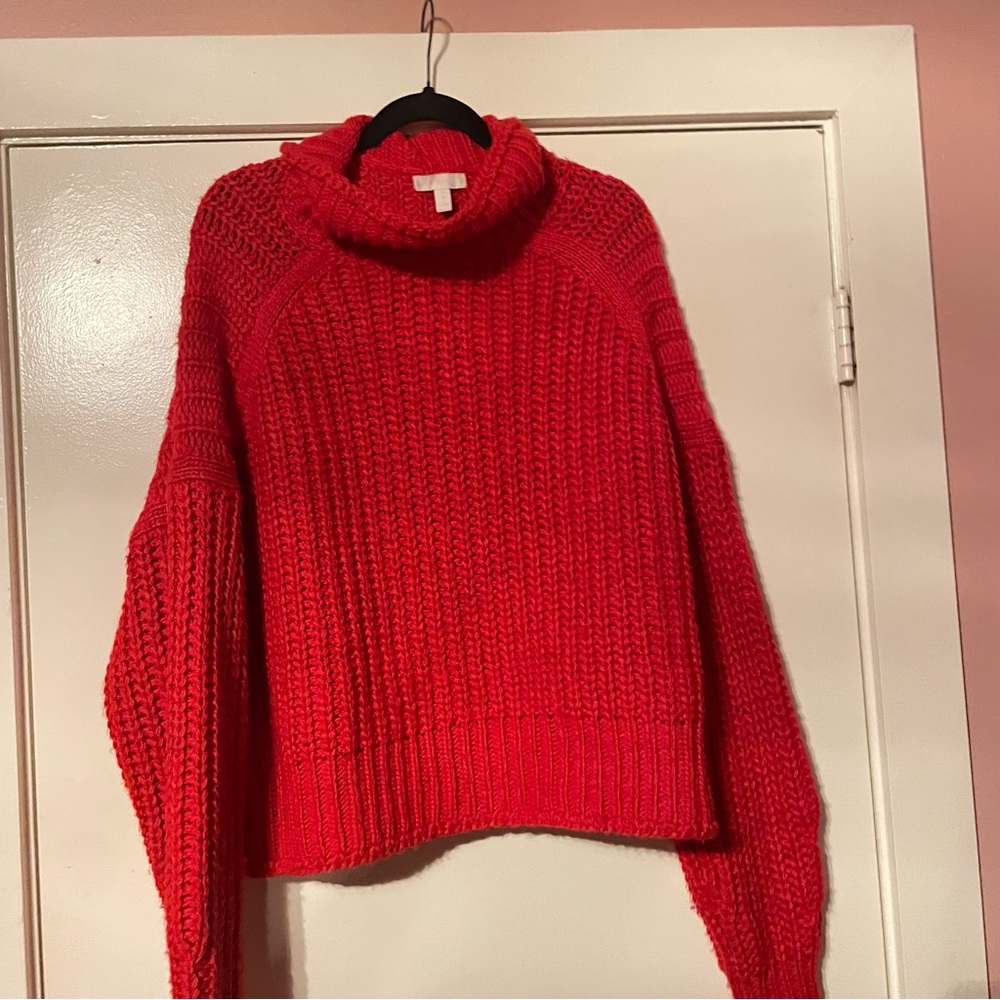 Chunky, long sleeved , red sweater.